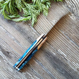 NORA #1485 - 3.5' Paring - Witte Teal Shokwood